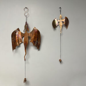 large and small copper dragons