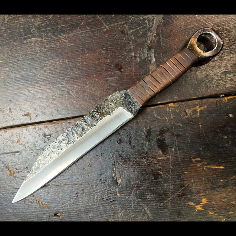 seax knife with ring pommel and leather wrapped handle