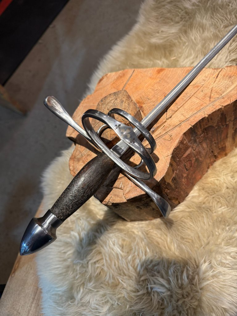 rapier hilt with fleur de lis details