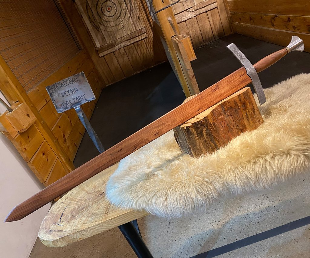 custom sword in wooden scabbard