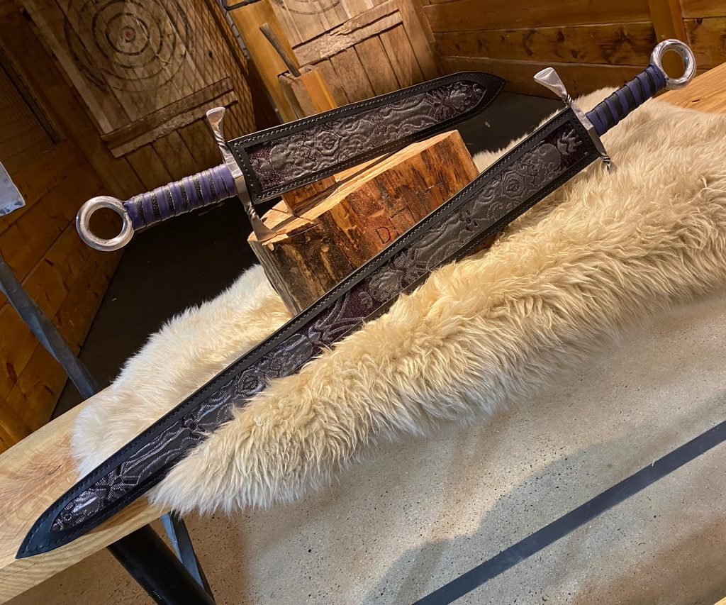 a pair of sheathed blades for Renn Faire